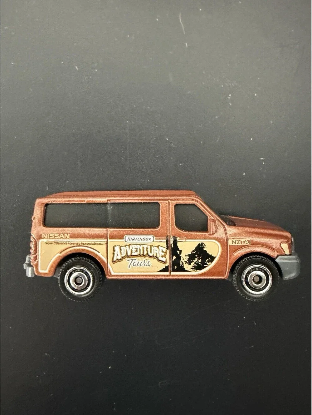 2014 Matchbox Nissan NV Passenger Van Adventure Tours New Zealand Tourist